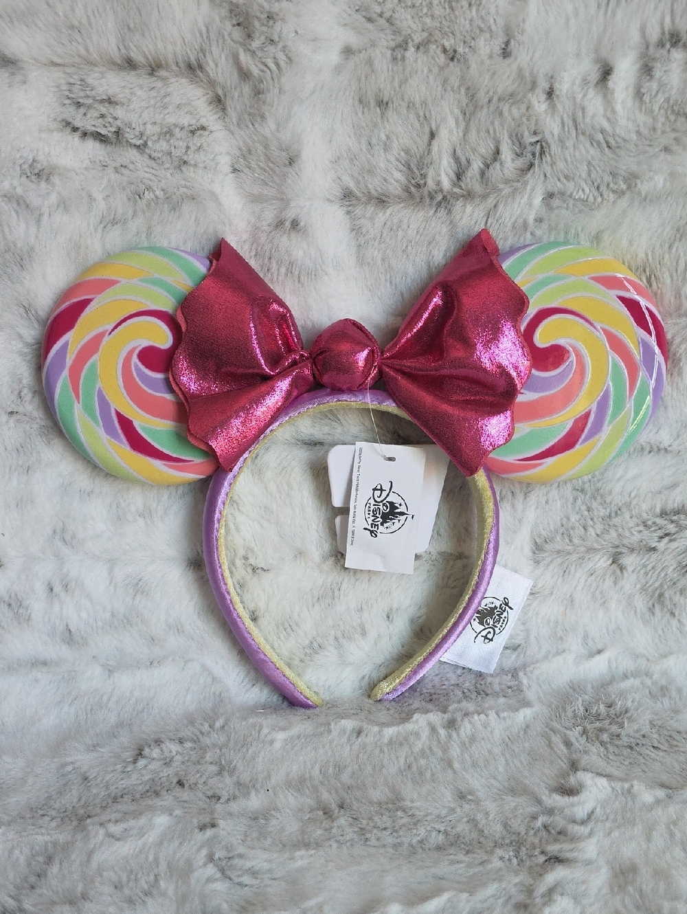 Disney Pastel Swirl Lollipop Minnie Ears Headband with Metallic Pink Bow
